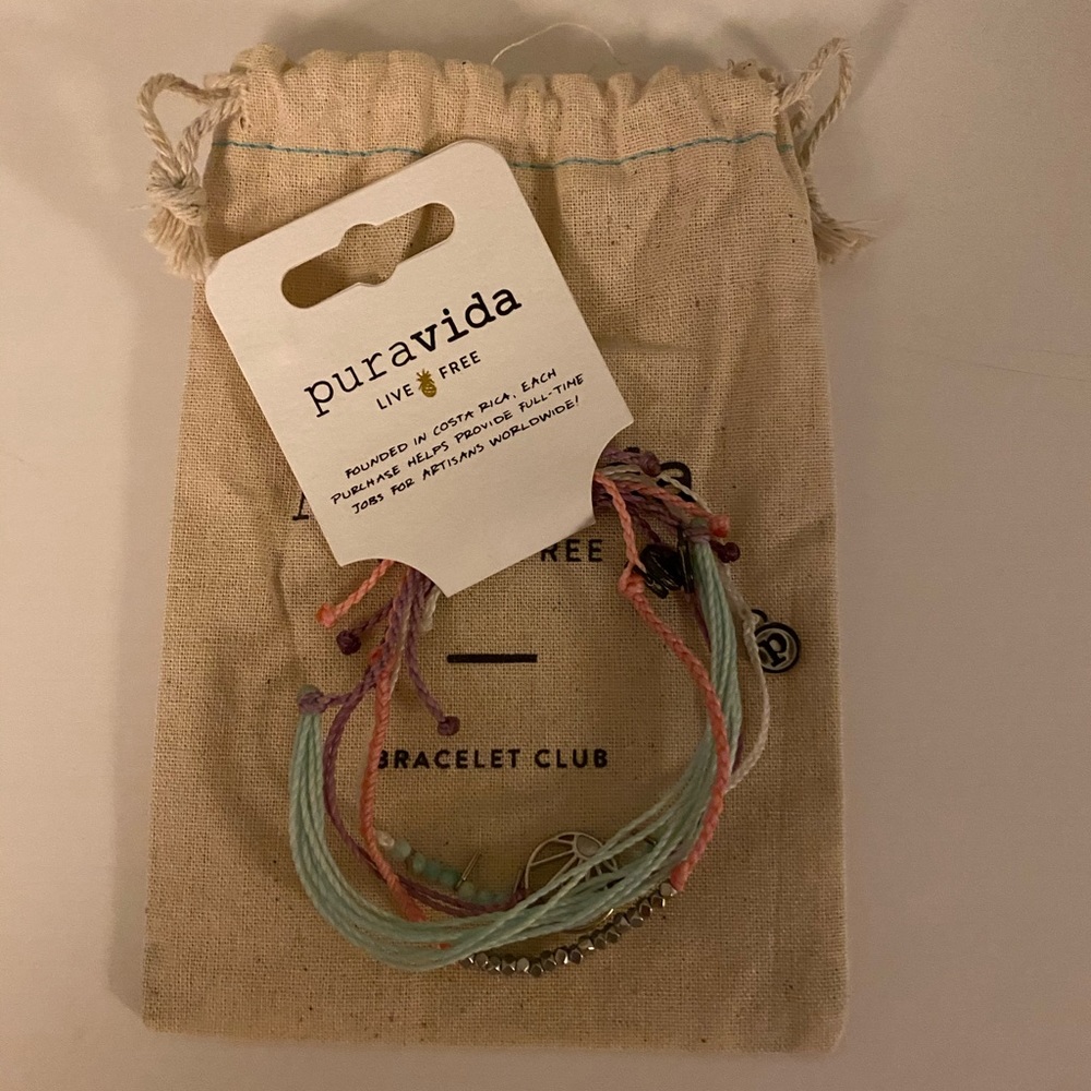 Four Pura Vida bracelets